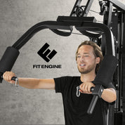 FitEngine Kraftstation | Multifunktions-Homegym für den ganzen Körper | Gewichte bis zu 67 kg einstellbar, mit Latzugstange, Beinpresse, Bizepscurl-Polster u.v.m. | Hochwertiges Stahlmaterial
